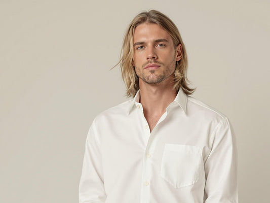 Man with long hair in minimalist, modern fashion style