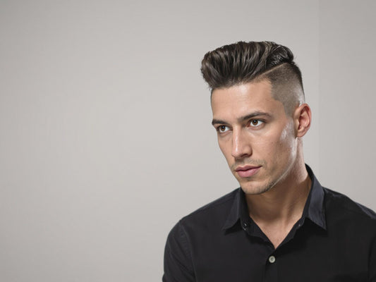 Modern stylish man with minimalist haircut and smooth skin
