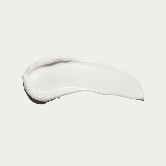 The Controlled Mess Forming Hair Cream texture swatch showing smooth and creamy consistency for taming thick, curly hair.