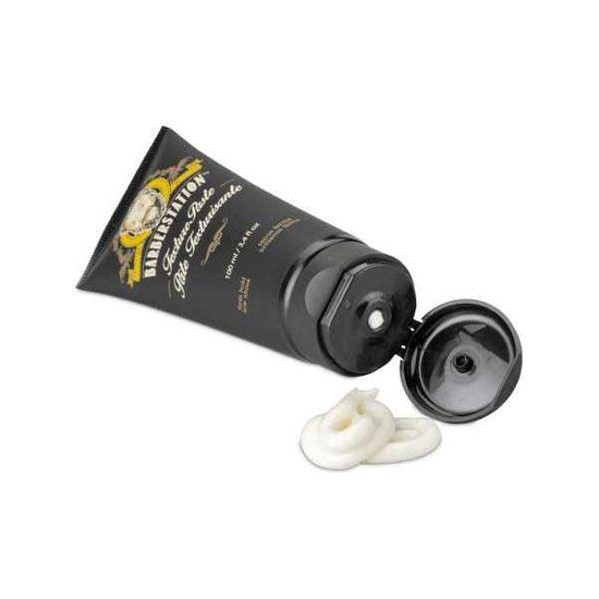 Barberstation Texture Paste tube with open cap and product squeezed out for strong, flexible hold and versatile hairstyles.