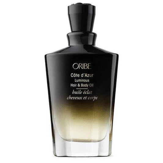 Oribe Cote D'Azur Luminous Hair And Body Oil bottle - luxury and nourishing oil for radiant hair and skin, with French Riviera scent
