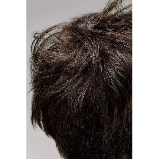 Close-up of hair with added volume and texture using Oribe Dry Texturizing Spray.