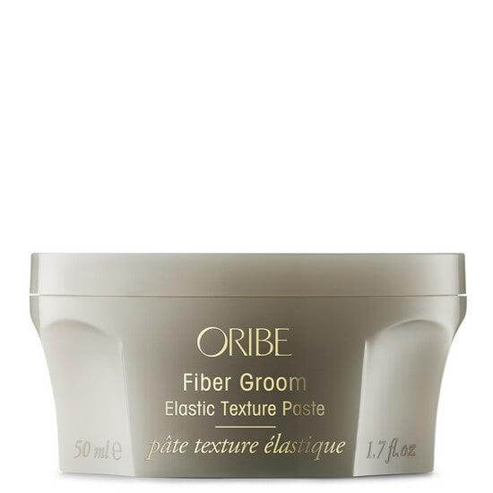 Oribe Fiber Groom Elastic Texture Paste 50ml in beige container for natural matte finish and flexible hold.