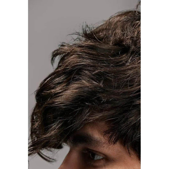 Close-up of texturized hair styled with Oribe Flash Form Finishing Spray Wax