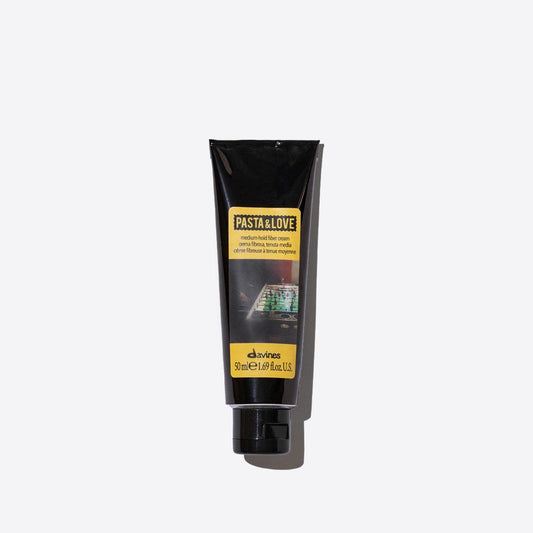 Davines Medium Hold Fiber Cream tube on white background