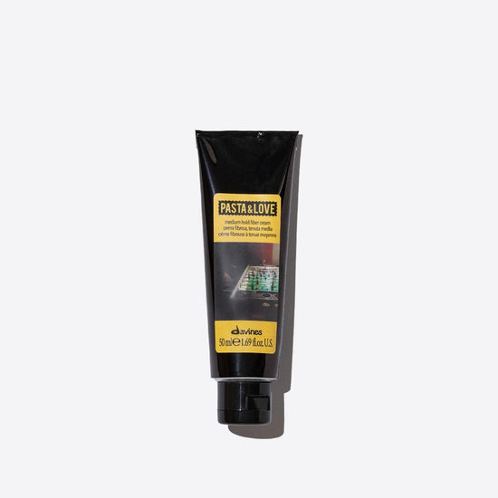 Davines Medium Hold Fiber Cream tube on white background