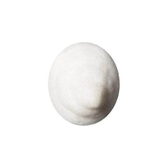 Oribe The Cleanse Clarifying Shampoo close-up foam texture for deep cleansing and removal of buildup and impurities